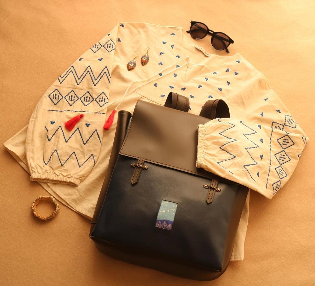 کوله پشتی چرم قهوه‌ای