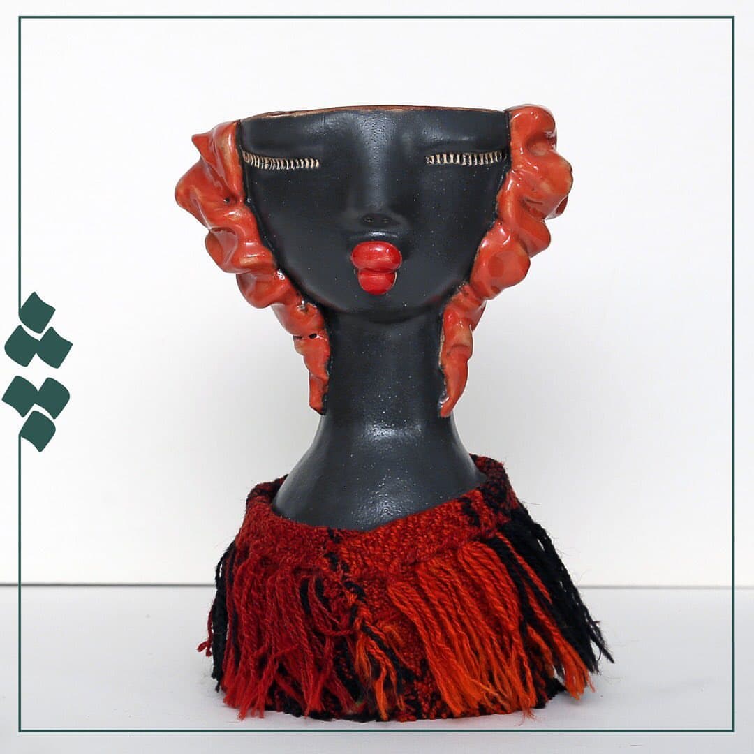 مجسمه سفالی چله با گلیم عشایری