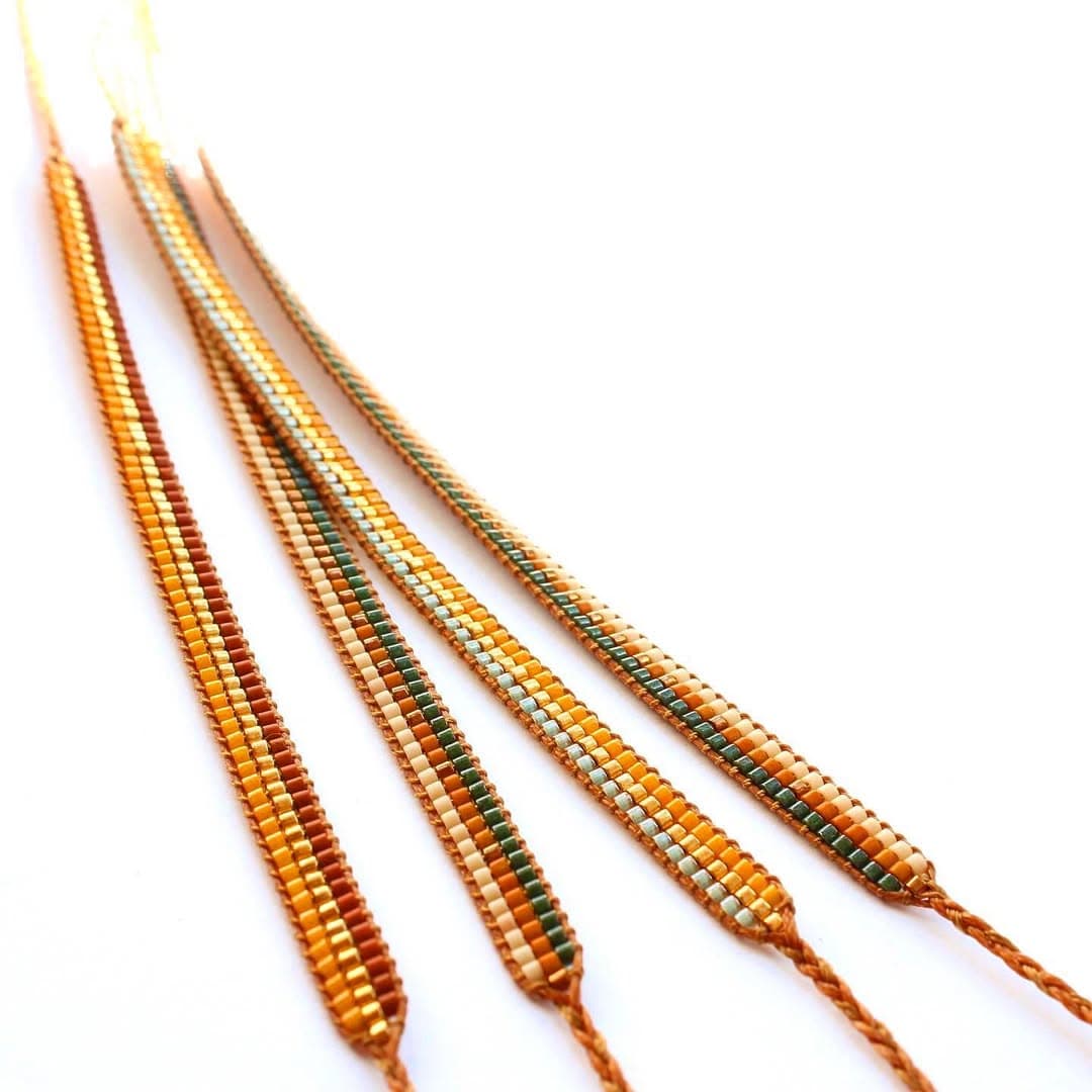 دستبند منجوقی میوکی و چرم مدل سه‌راه