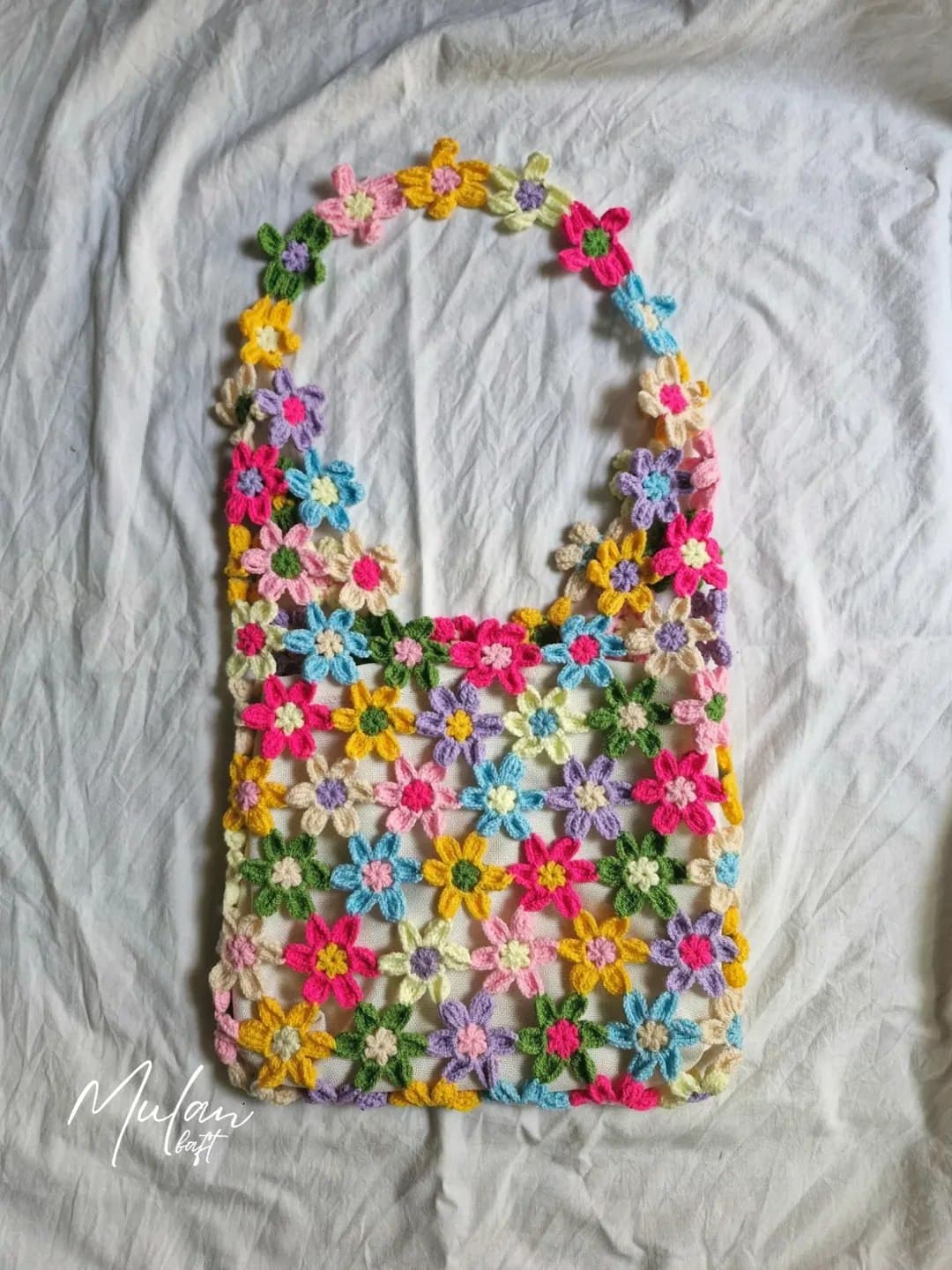 کیف دوشی بافتنی دستبافت مدل گل های بهاری