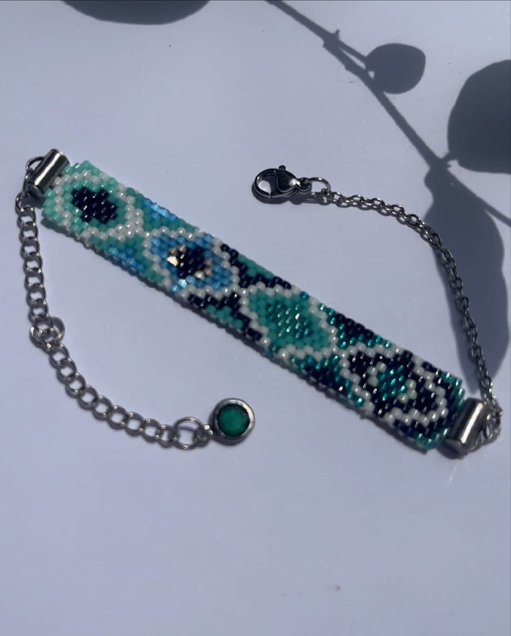 دستبند دستساز منجوقی میوکی با طرح چشم نظر و زنجیر استیل