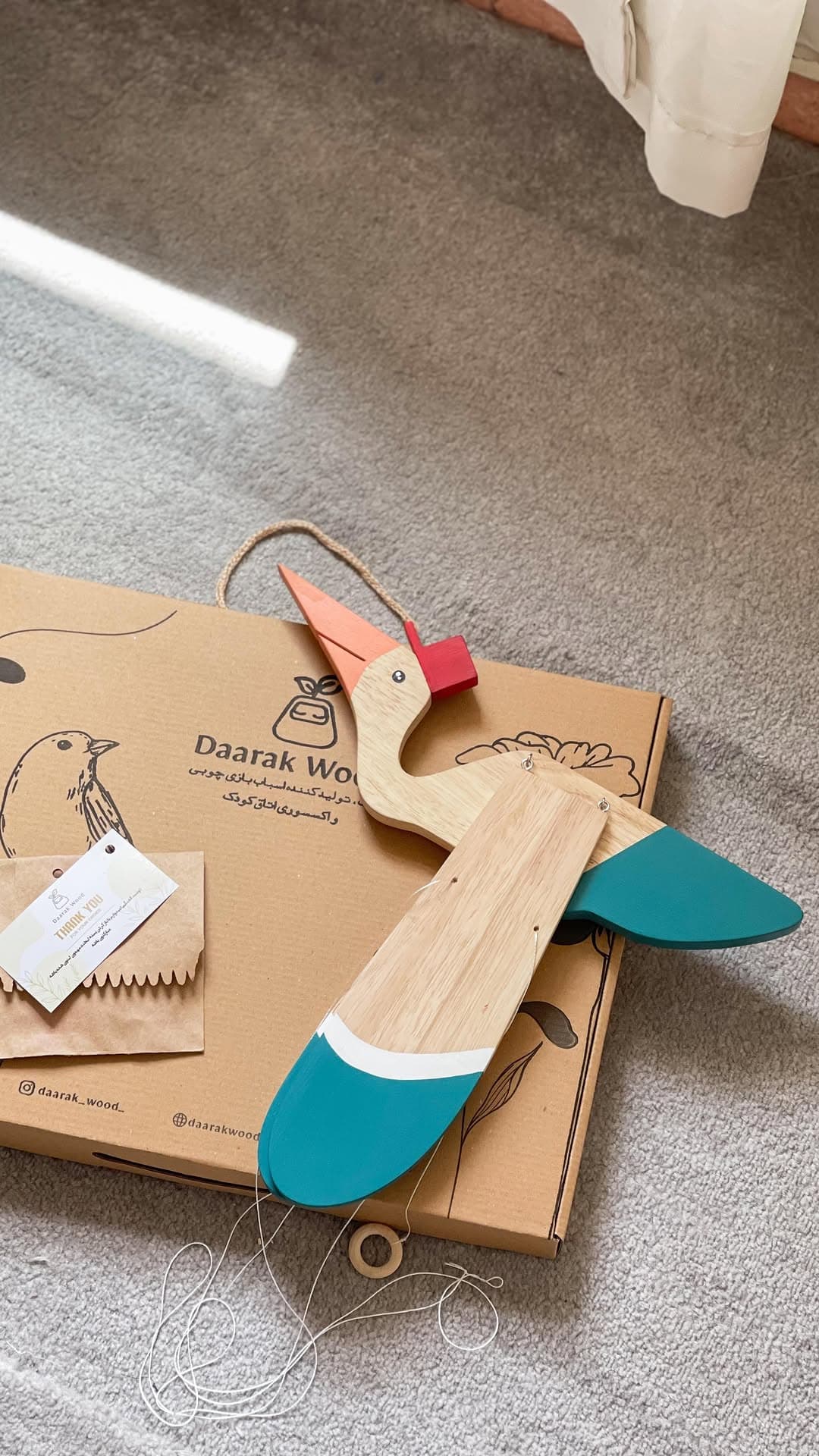 آویز دکوری چوبی طرح لک لک بالزن